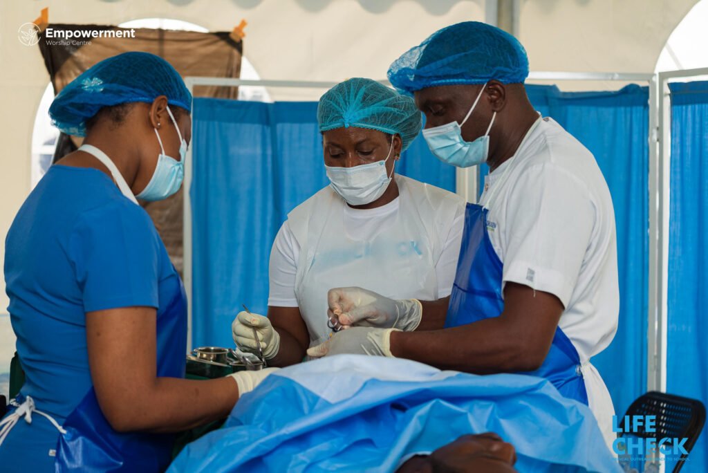 Medical team performing a minor surgical procedure at LifeCheck 2025